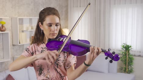 Musician-woman-playing-the-violin-at-home.-Violinist,-Music-teacher.